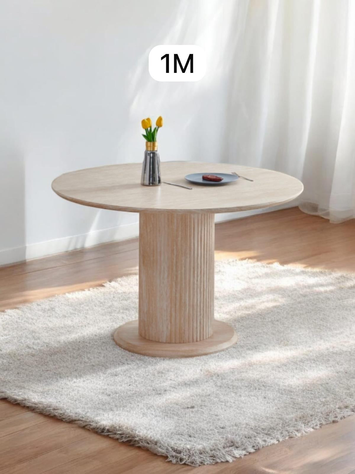 TABLE A MANGER AXEL TRAVERTIN RONDE 1M